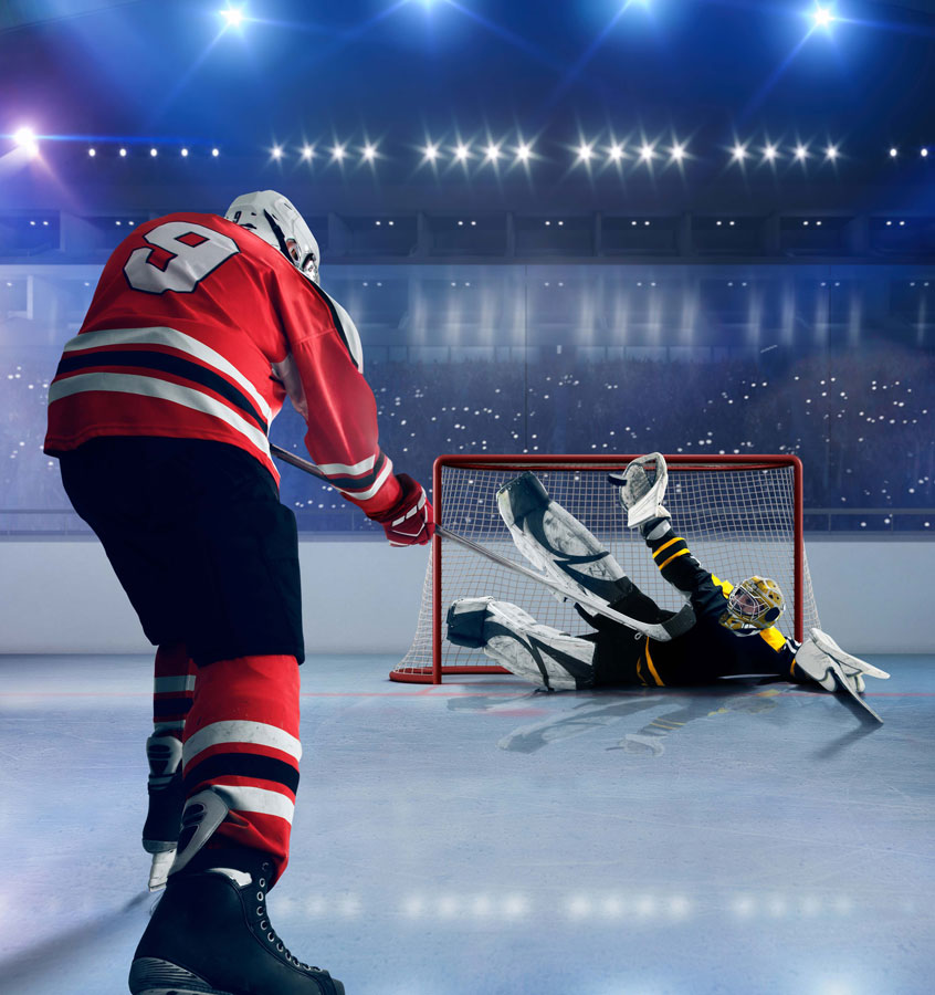 hockey-player-shooting-on-goal-improve-skills-at-hockey-rink
