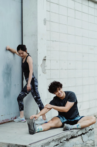 two-people-stretching